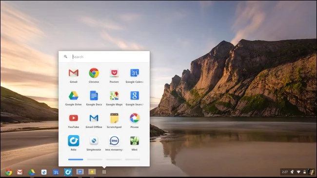 Chromebook beside a laptop showing a desktop interface