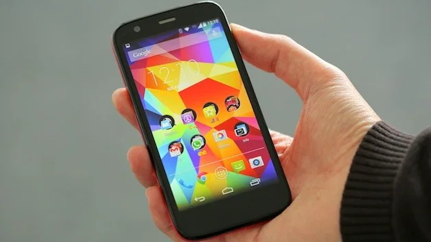 Motorola Moto G smartphone held in a hand.