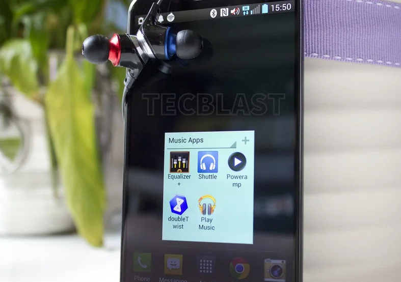 Android music player app showing playback controls and a playlist